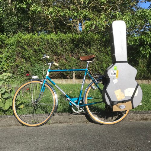 Guitar holder on bicycle